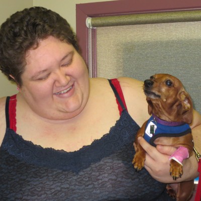 lady holding tiny dog